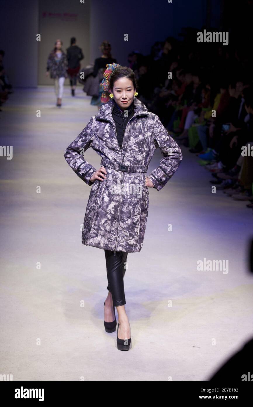 A model wears a creation by South Korean designer Sylvia Oh during a ...