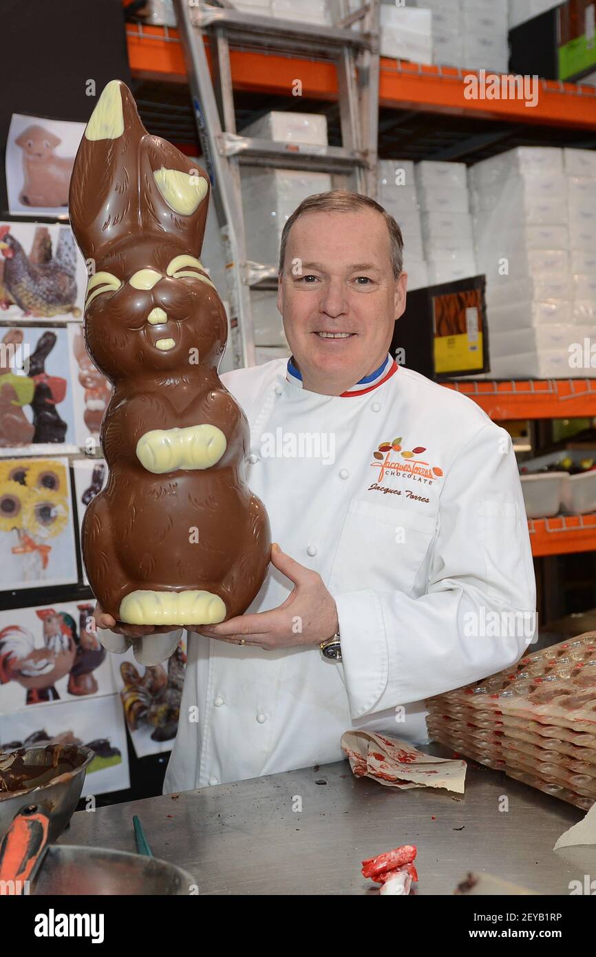 Chocolatier Jacques Torres poses with his chocolate creation a