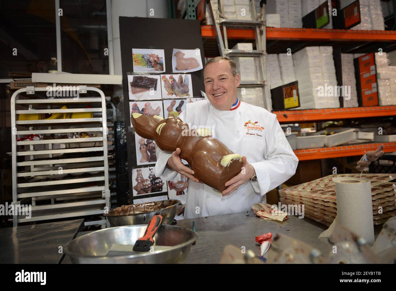 Chocolatier Jacques Torres poses with his chocolate creation, a six lbs