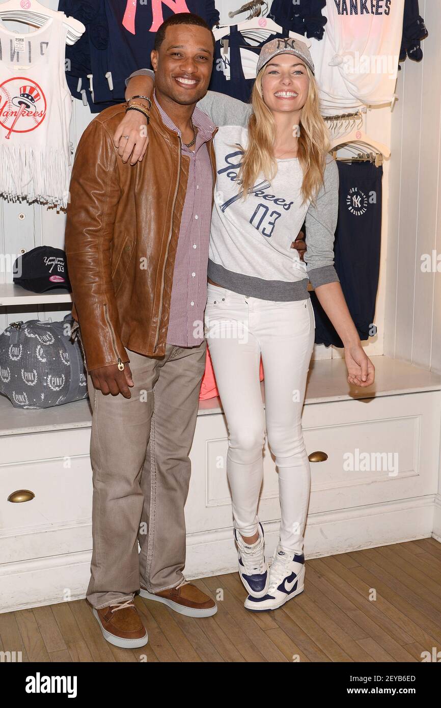 L-R) New York Yankee Robinson Cano and Victoria Secret PINK model Jessica  Hart celebrate the launch of the Victoria's Secret PINK MLB Collection at  Victoria Secret Soho in New York, NY, on