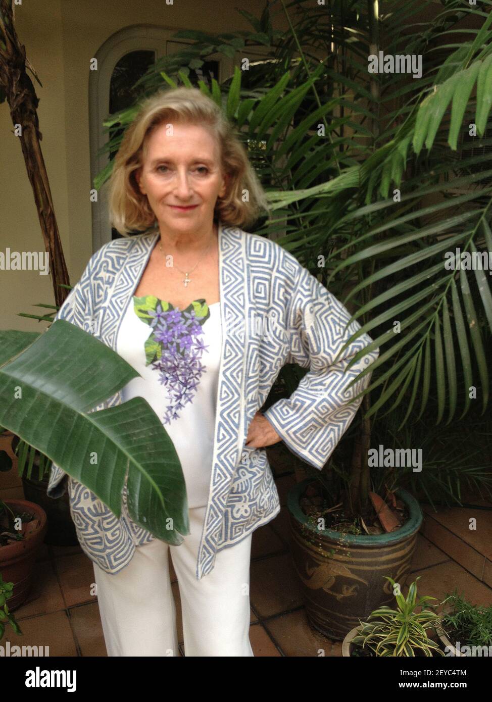 Fashion designer Helene Breebaart models her best-selling mola-inspired  design: a two-tone jacket in denim fabric. The appliqued T-shirt she wears  is also of her design. (Photo by Mimi Whitefield/Miami Herald/MCT/Sipa USA  Stock