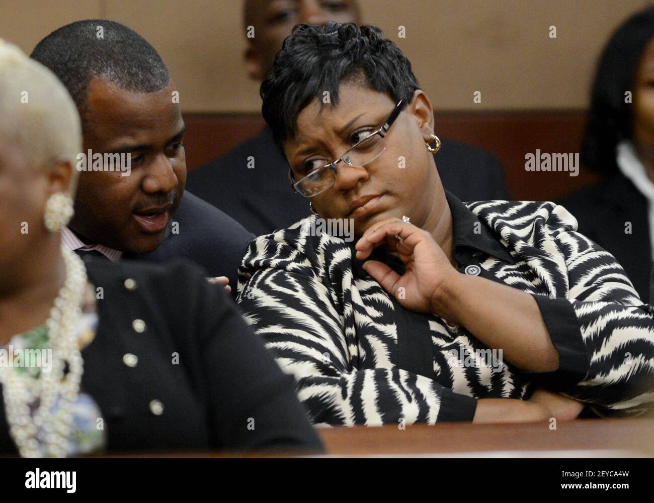 Atlanta Public Schools Area superintendent Tamara Cotman, right, talks with her lawyer Benjamin Davis during a court hearing in Atlanta, Georgia, Thursday, May 2, 2013. Fulton County Superior Court Judge Jerry Baxter Atlanta Public Schools Area superintendent Tamara Cotman, right, talks with her lawyer Benjamin Davis during a court hearing in Atlanta, Georgia, Thursday, May 2, 2013. Fulton County Superior Court Judge Jerry Baxter