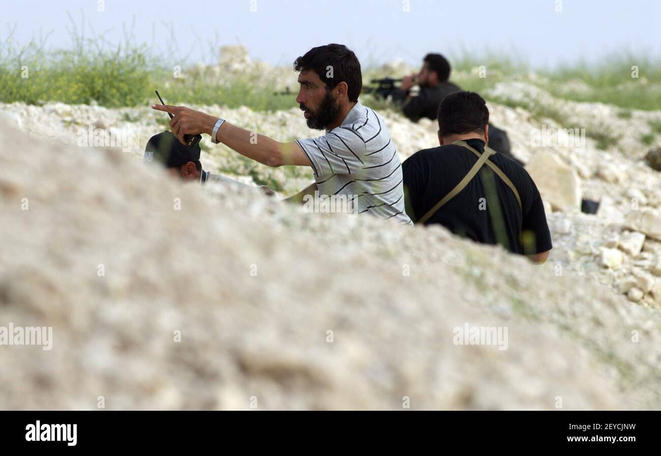 Yousef Hassan, a Syrian rebel commander of the Afhad al Rasoul Brigades ...