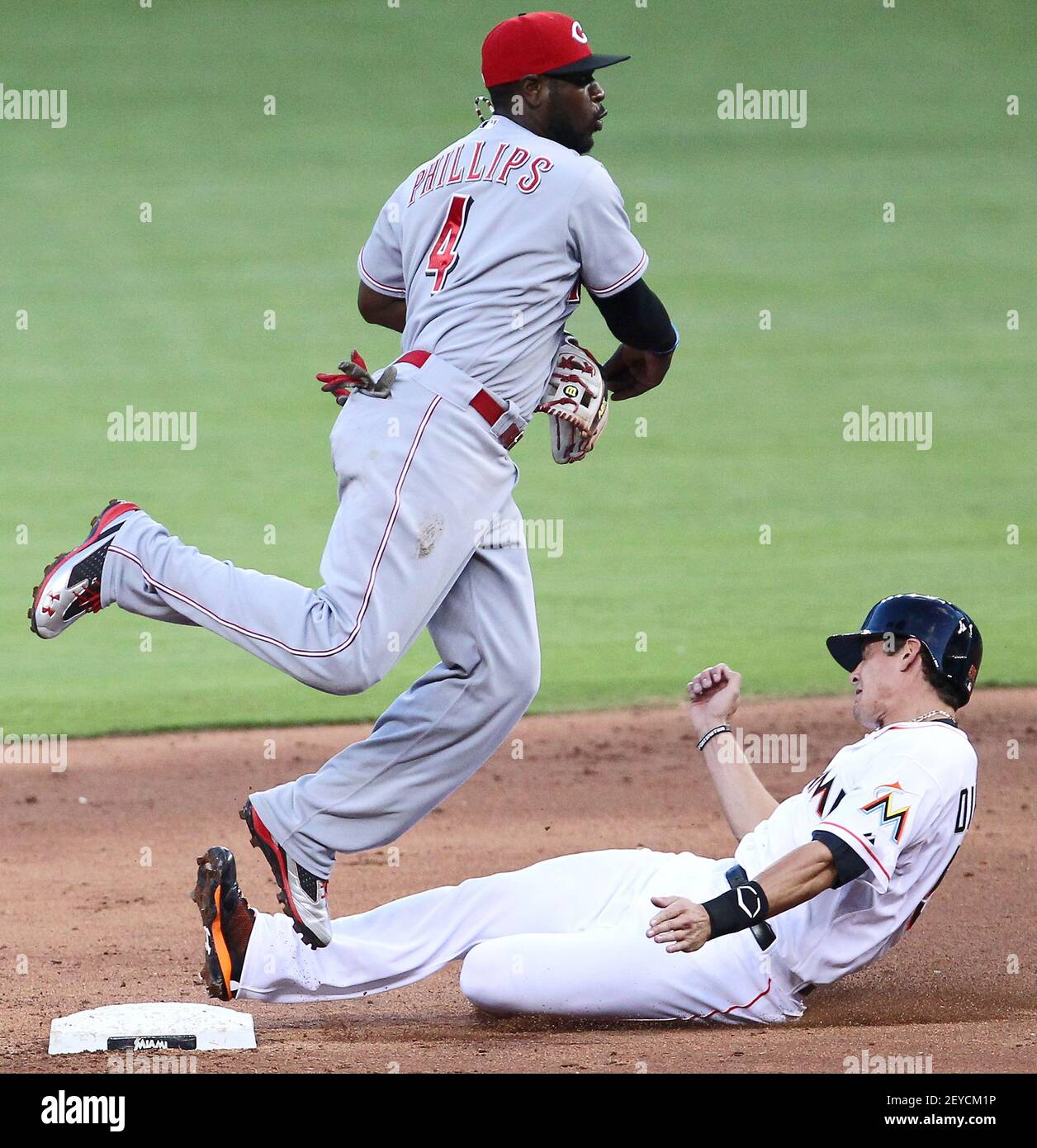 Brandon Phillips (4) throws to first base during the game between