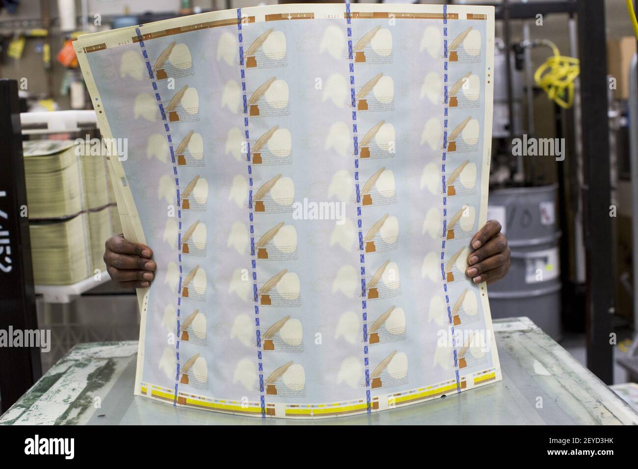 The newly redesigned $100 bill being printed at the Bureau of Engraving ...