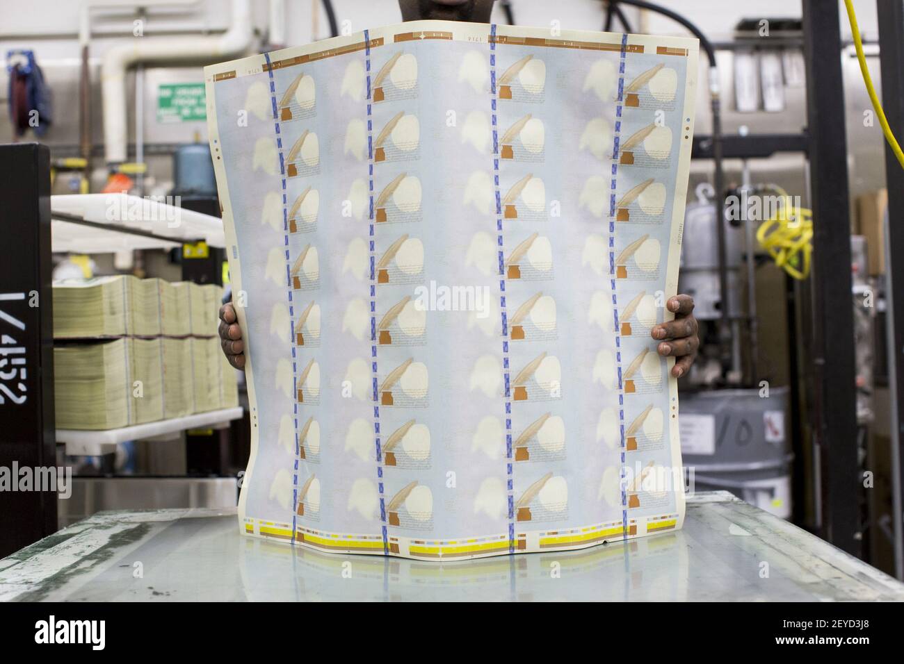 The newly redesigned $100 bill being printed at the Bureau of Engraving ...