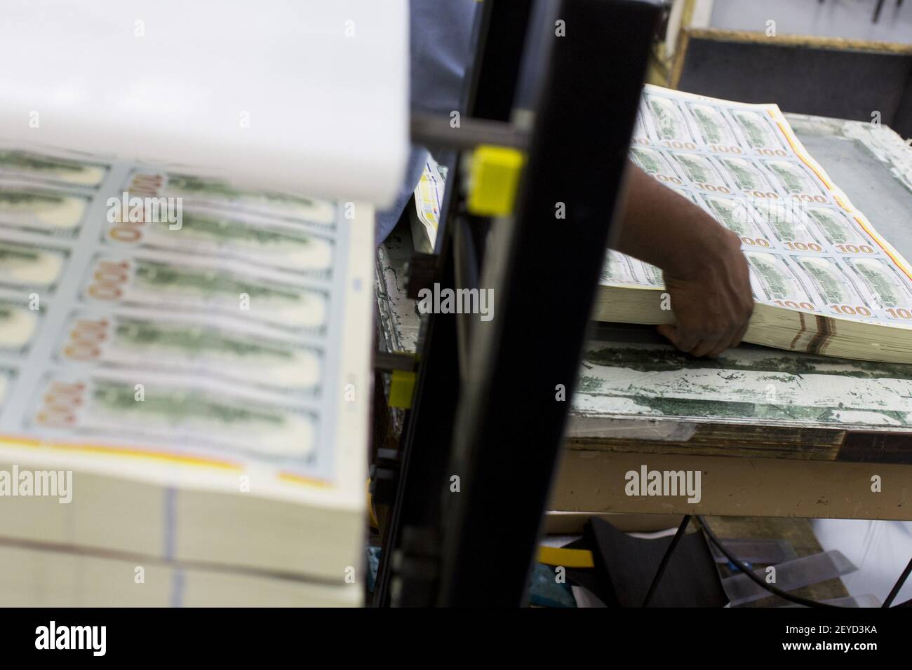 The newly redesigned $100 bill being printed at the Bureau of Engraving ...