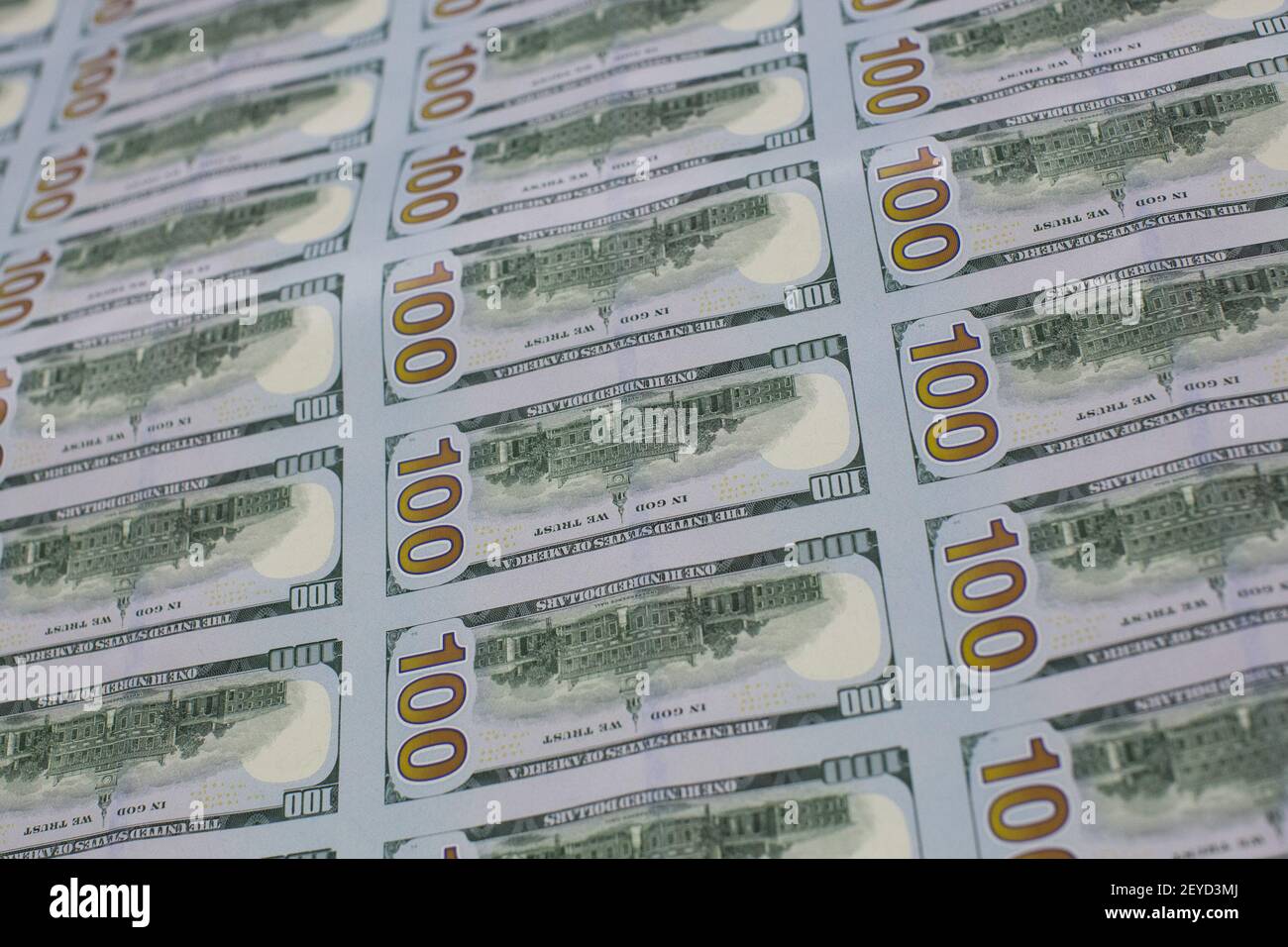 The newly redesigned $100 bill being printed at the Bureau of Engraving ...