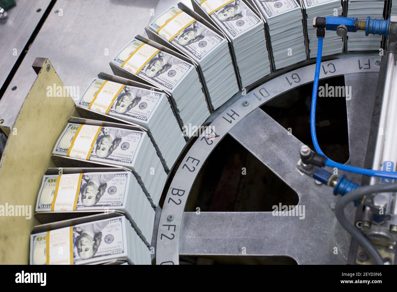 The newly redesigned $100 bill being printed at the Bureau of Engraving ...