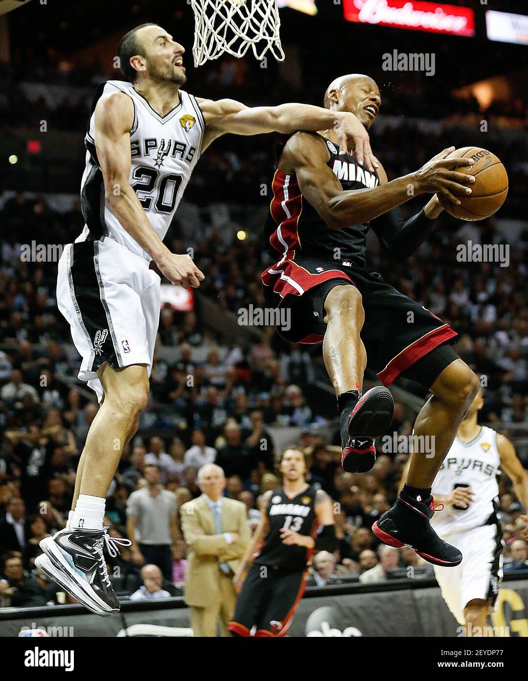 San Antonio Spurs' Manu Ginobili, left, fouls Miami Heat's Ray Allen as he goes to the basket during the fourth quarter in Game 5 of the NBA Finals at the AT&T Center in San Antonio, Texas, Sunday, June 16, 2013. (Photo by Al Diaz/Miami Herald/MCT/Sipa USA) Stock Photo