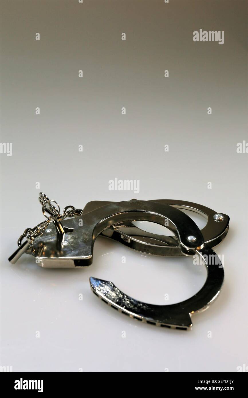 handcuffs and keys Stock Photo