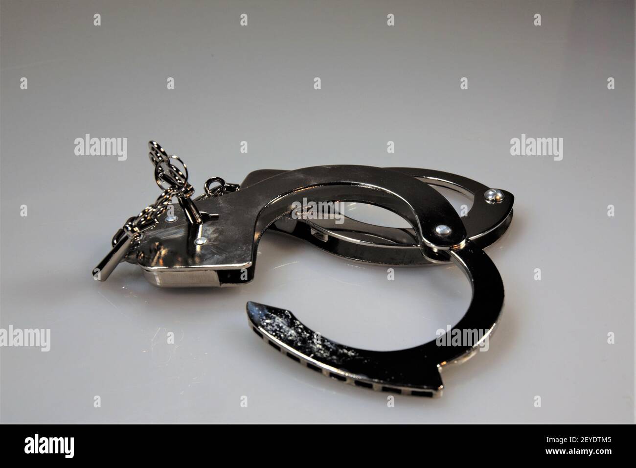 handcuffs and keys Stock Photo