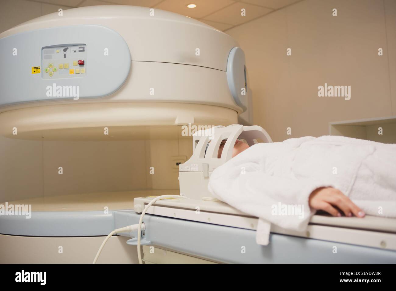 Patient being scanned and diagnosed on a computed tomography Stock Photo