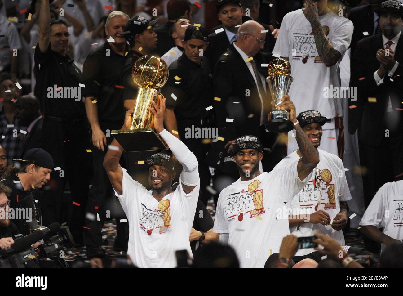 With trophies in hand the Miami Heat s LeBron James and Dwyane Wade celebrate after a 95 88 win against the San Antonio Spurs in Game 7 of the NBA Finals at the AmericanAirlines