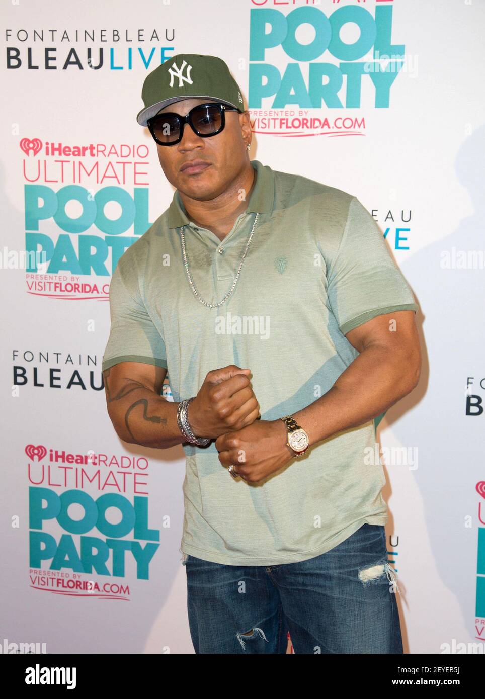 LL Cool J pose backstage at the iHeartRadio Ultimate Pool Party