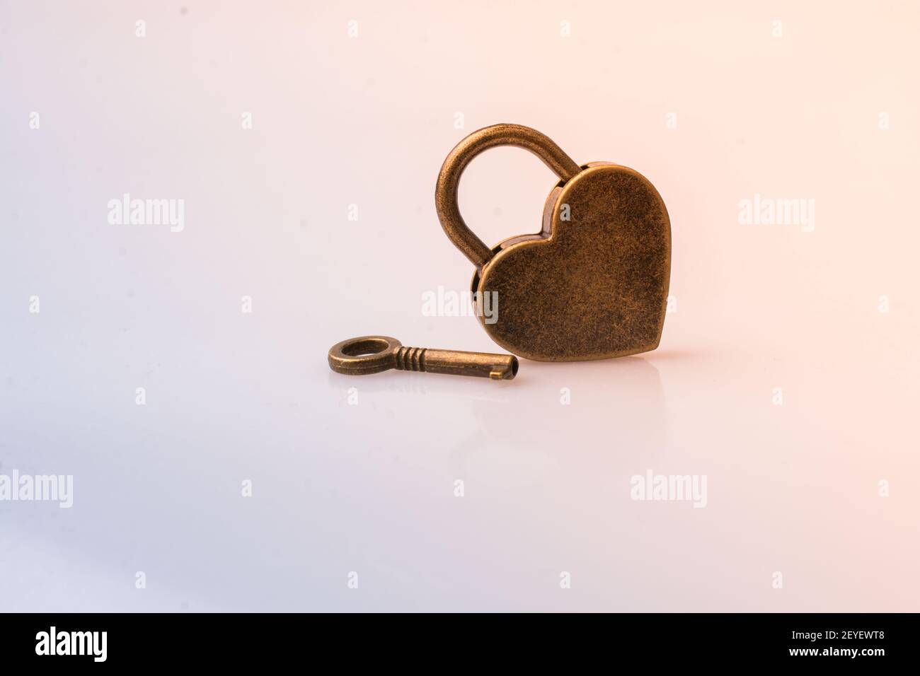 Metal padlock in heart shape as symbol of love Stock Photo - Alamy