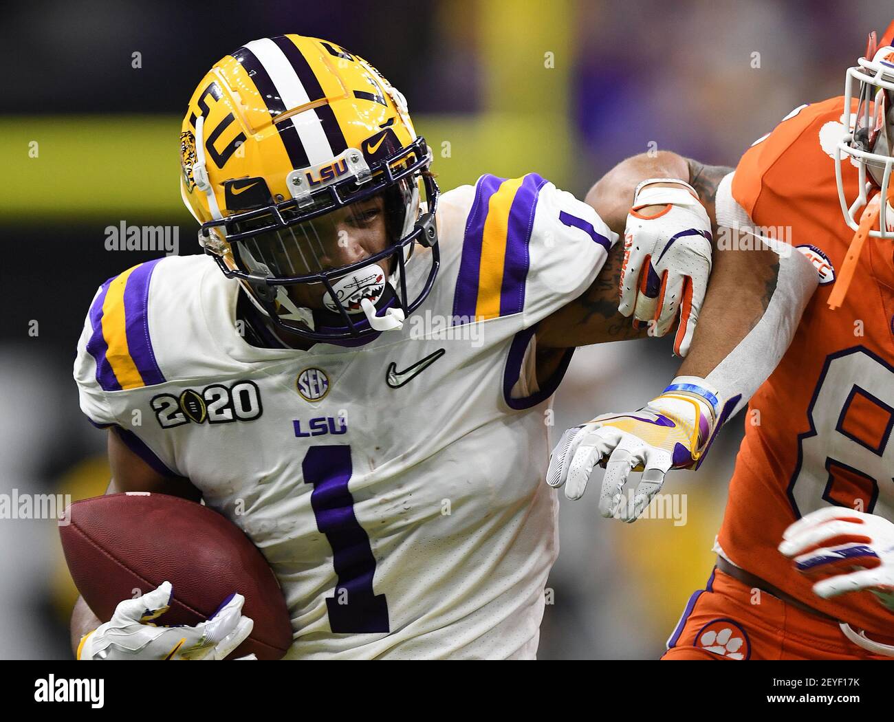 (FILE PHOTOS).former LSU Tigers wide receiver (1) Ja'Marr Chase is projected to go in the 1st Round of the 2021 NFL Draft, here he is pictured on January 13, 2020 versus the Clemson Tigers, the NFL Draft will be held in Cleveland, Ohio on April 29, 2021.(Mandatory Credit: Jose/MarinMedia.org/Cal Sport Media) (Absolute Complete photographer, and credits required) Stock Photo