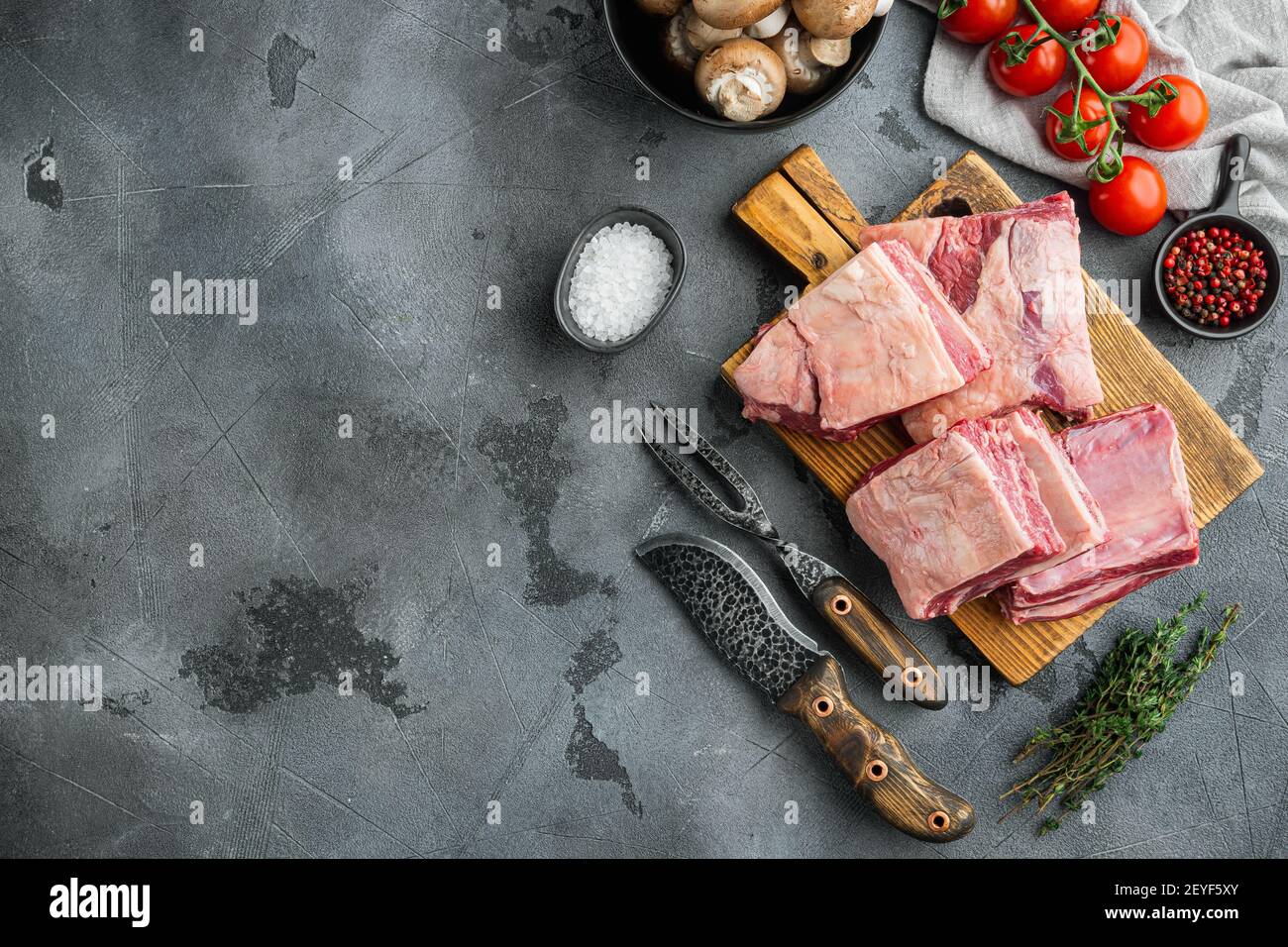 Raw beef short rib set, with ingredients, on gray stone background, top ...