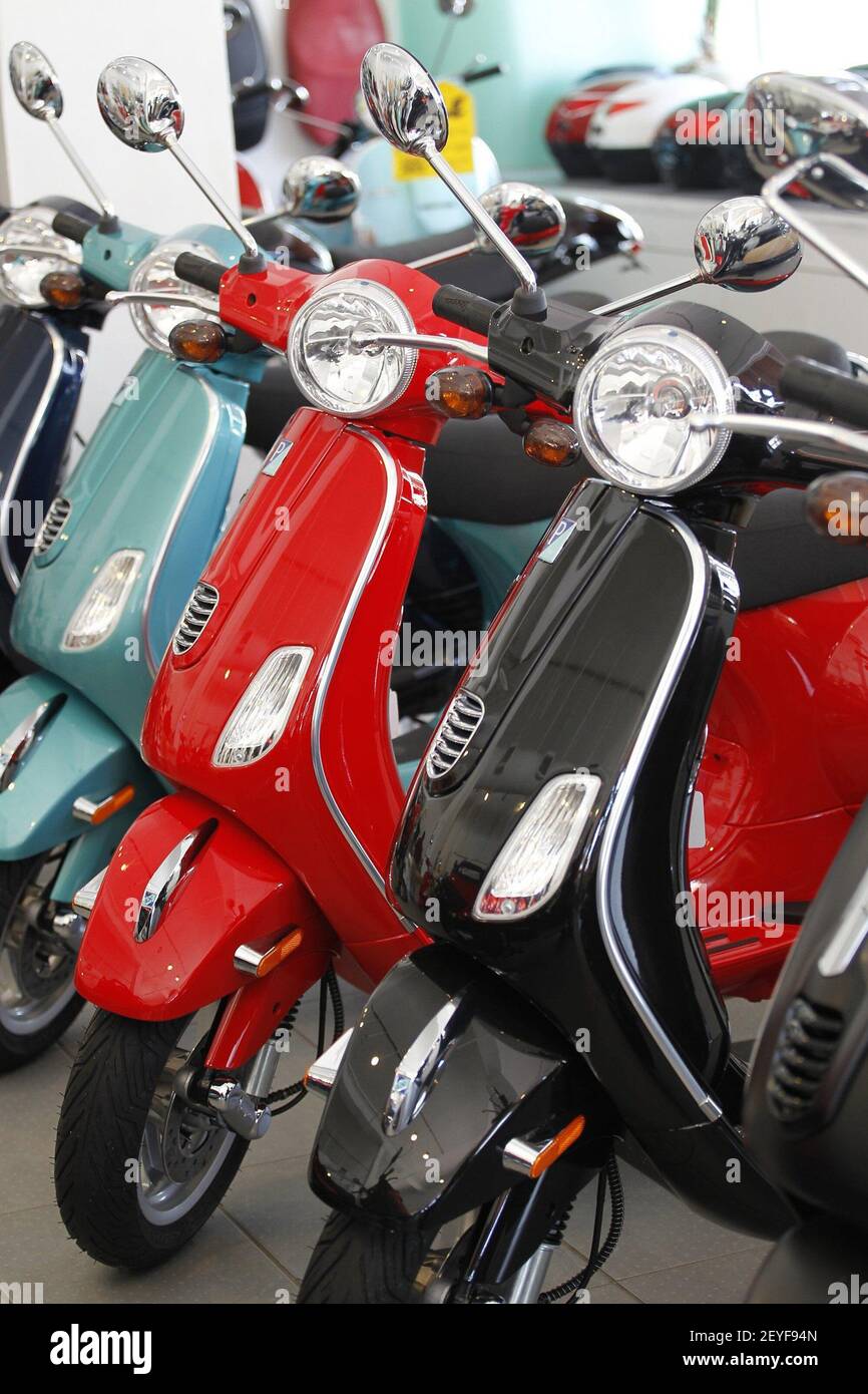 Vespa scooters come in various colors. The brand celebrates its 50th ...