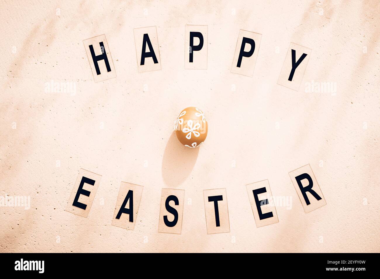 Minimalistic Easter composition. Retro style text. Top view. Flat lay Stock Photo