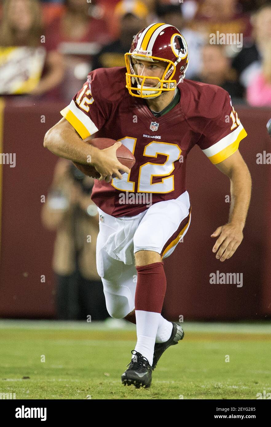 Washington Redskins quarterback Kirk Cousins (12) scrambles against the  Pittsburgh Steelers during the first half of their preseason game at FedEx  Field in Landover, MD, Monday, August 19, 2013. (Photo by Harry