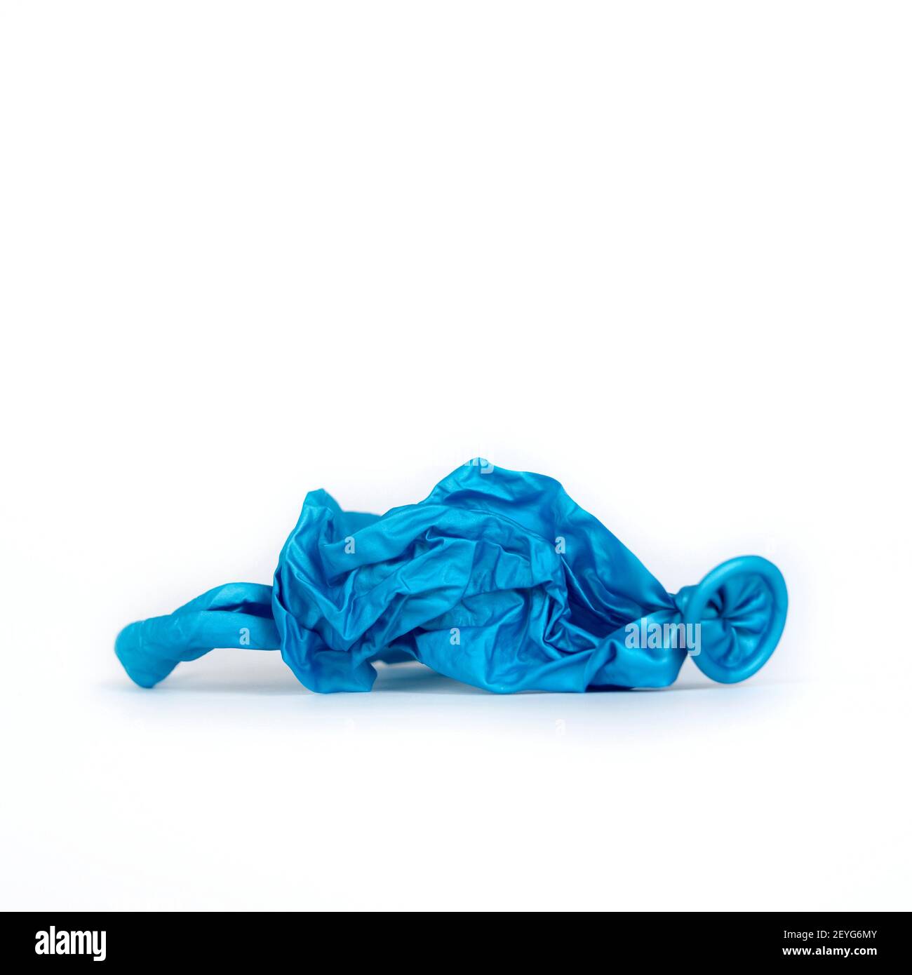 Deflated blue balloons isolated on white background Stock Photo