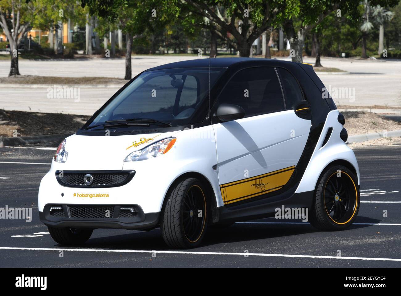 Custom car shop owner Craig Hoi Pong has customized his Smart Car with new wheels and a lowered