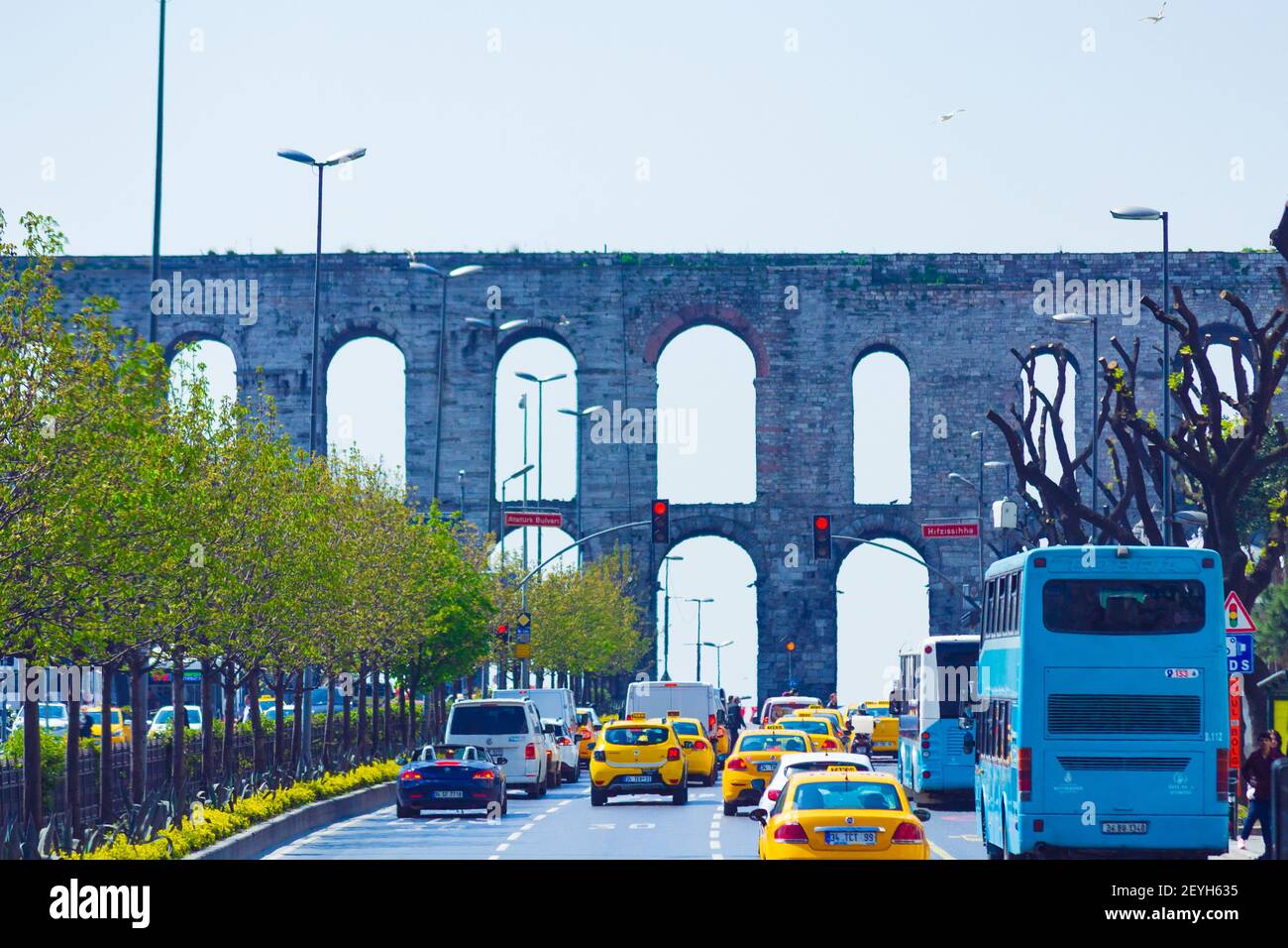 Street view with the Aqueduct of Valens (Turkish: Bozdoğan Kemeri) was a Byzantine aqueduct that supplied Constantinople with fresh water.Istanbul Stock Photo