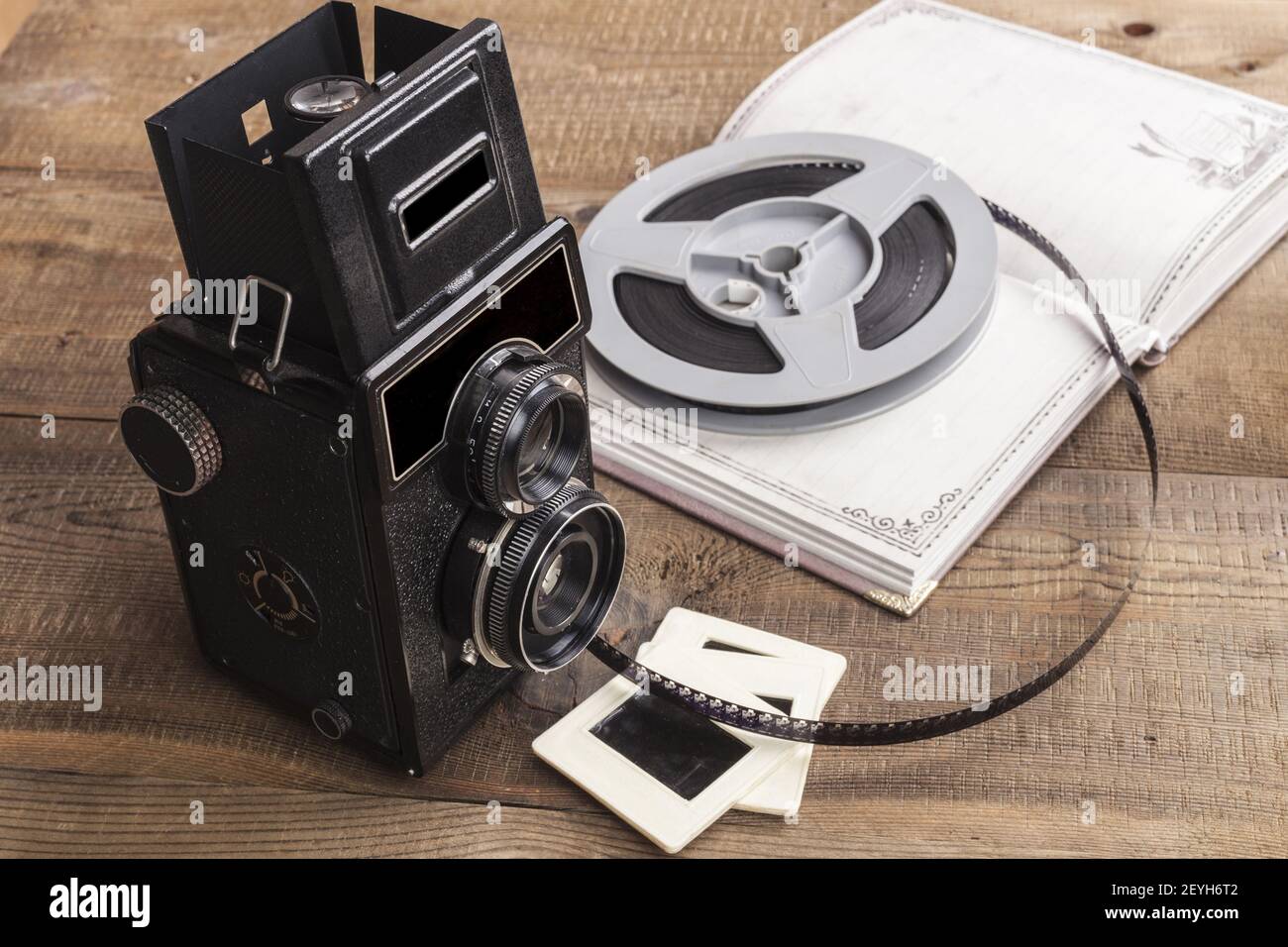 Camera and Notebook Stock Photo - Alamy