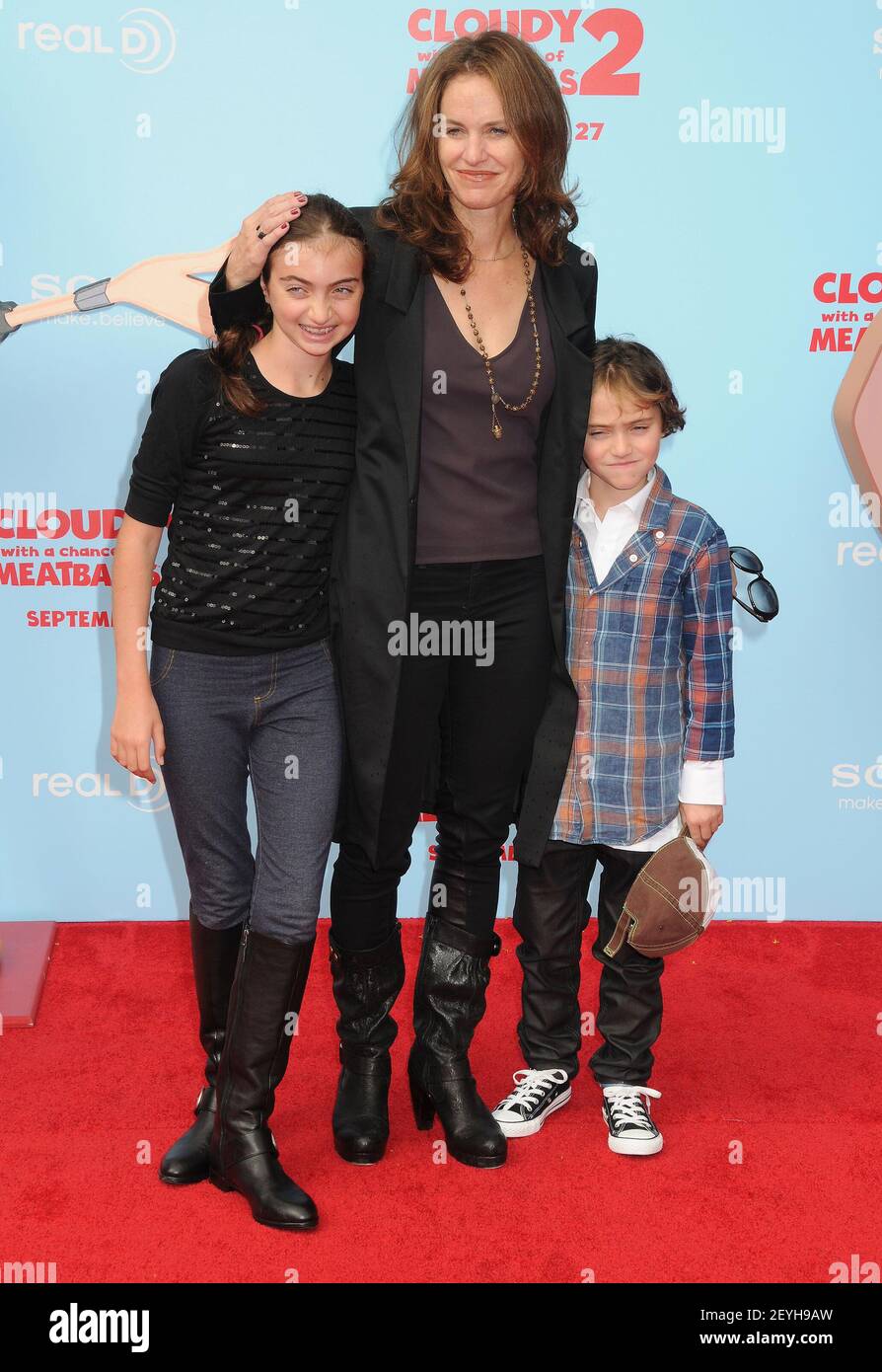 21 September 2013 - Westwood, California - Amy Brenneman and her children Bodhi Russell Silberling (L) and Charlotte Tucker Silberling. 'Cloudy With A Chance Of Meatballs 2' Los Angeles Premiere held at Regency Village Theatre. Photo Credit: Byron Purvis/AdMedia/Sipa USA Stock Photo