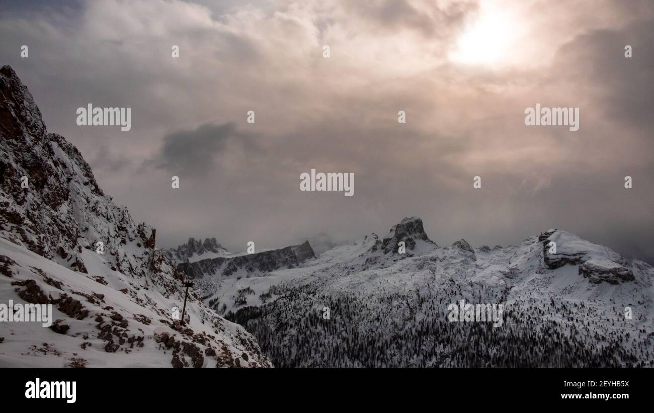Clouds carrying snow in the italian alps Stock Photo - Alamy