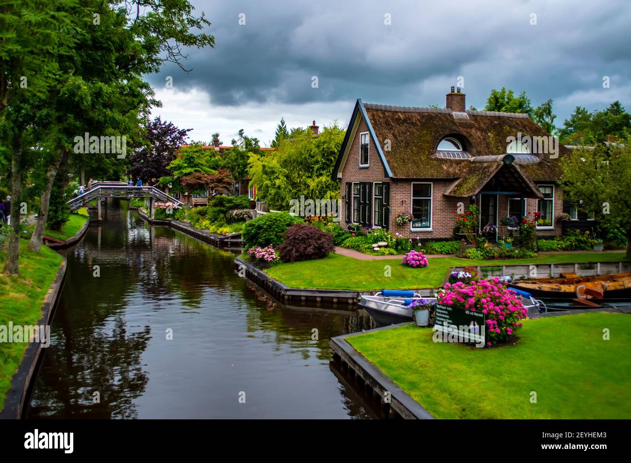 Giethoorn, Netherlands - July 6, 2019: Cute rural Dutch house, known as 'Dog House' for resemblance to a dog, in the famous village of Giethoorn Stock Photo