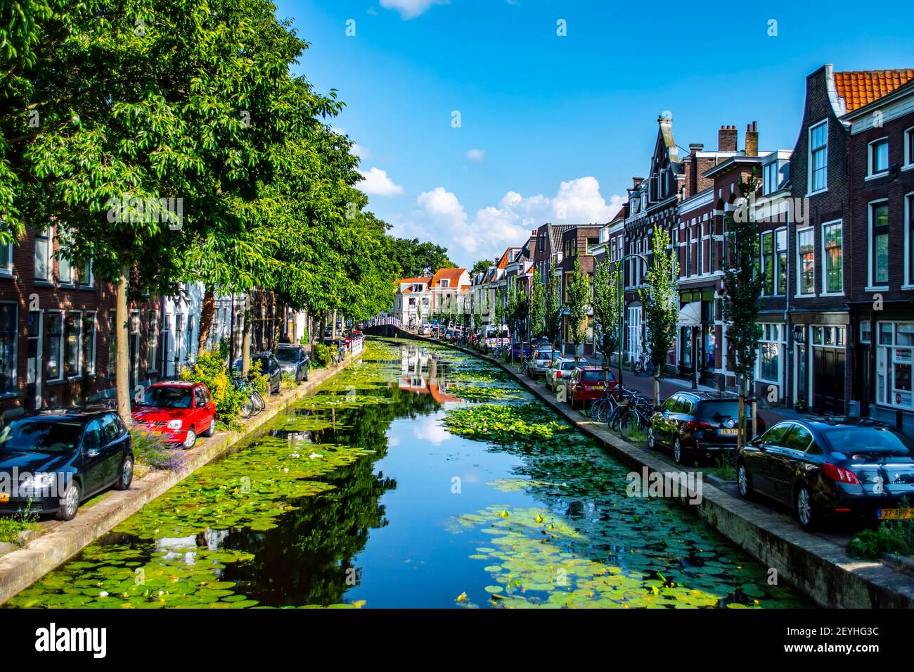 Delft, Netherlands - July 11, 2019: View of canals and brick houses of the town of Delft in the Netherlands Stock Photo