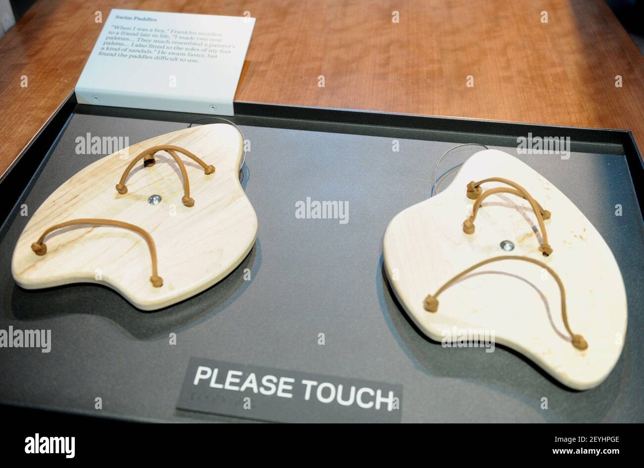 Swim paddles, designed by Ben Franklin, are on display at the
