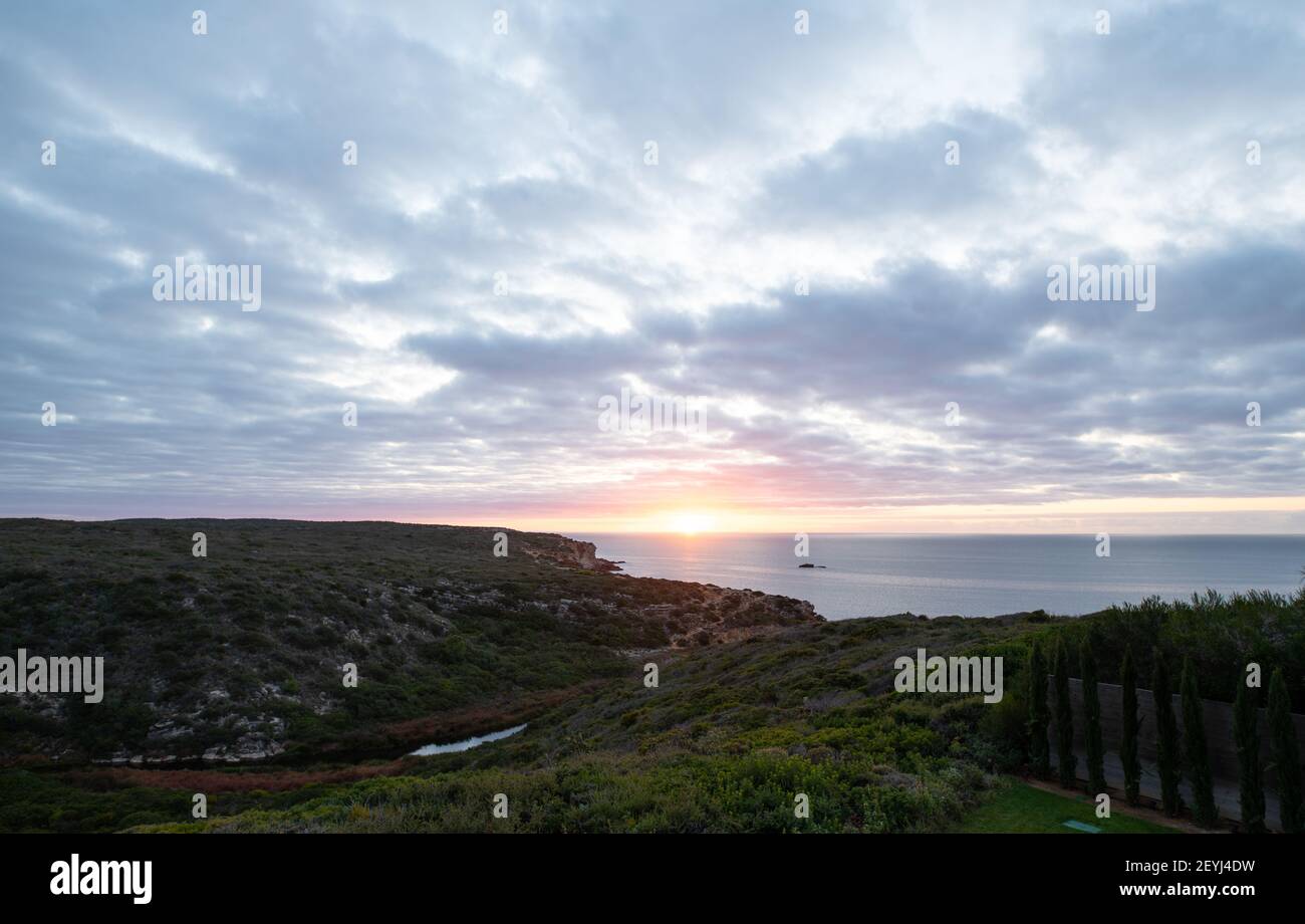 Sunrise in the western algarve in Portugal Stock Photo