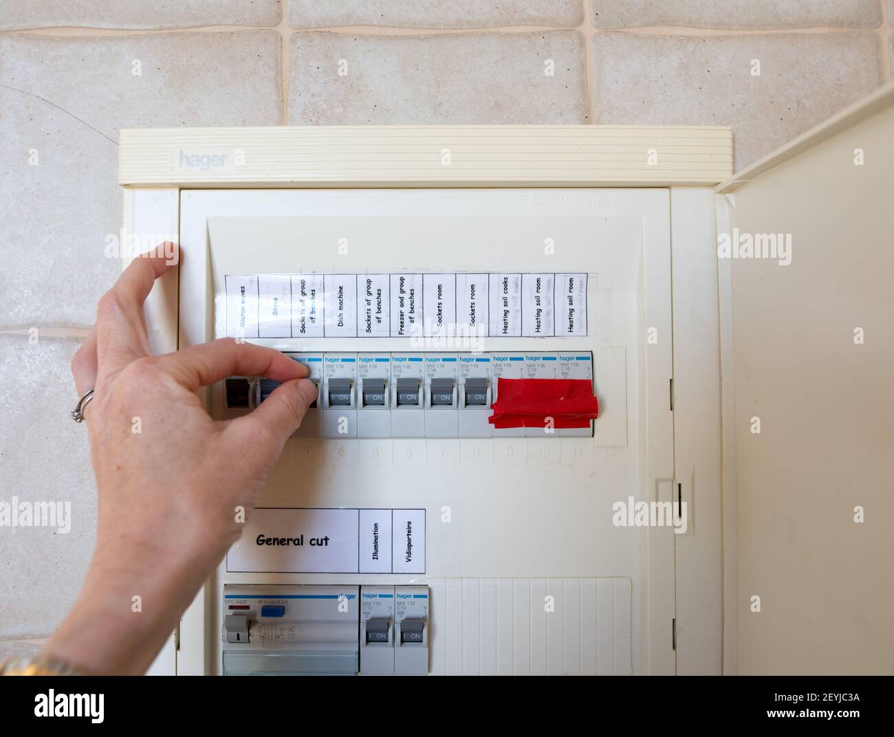 Lagos, Portugal: February 2021; Hager distribution or electrical panel on a tiled kitchen wall Stock Photo