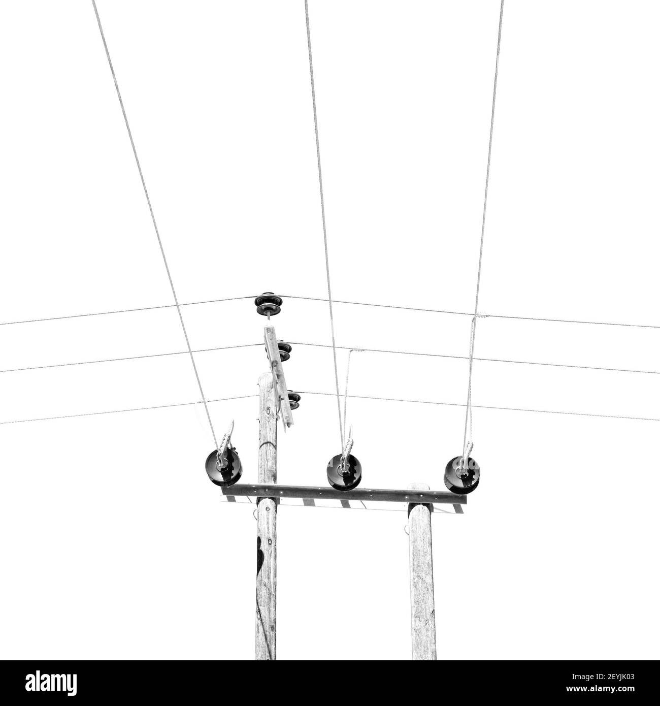 In oman the electric cable wood pylon energy and current line Stock