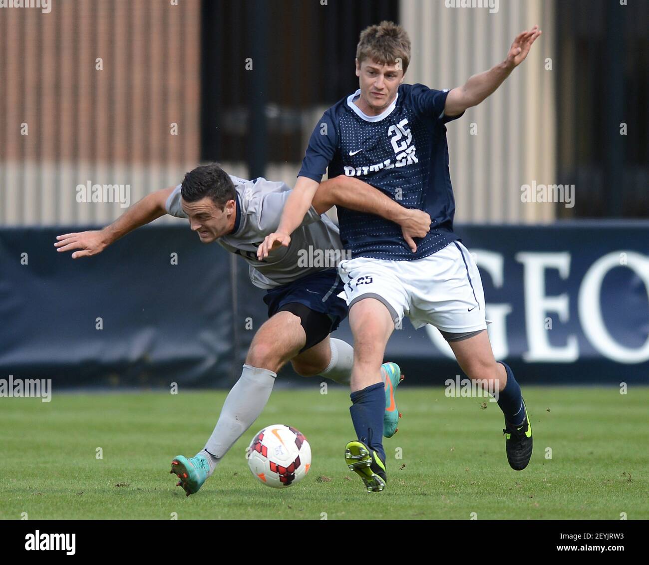 Georgetown forward Brandon Allen (10), left, and Butler defender Jordan (25) battle for the ball during first-half action at Shaw Field in Washington, D.C., Saturday, October 19, 2013. Georgetown defeated Butler,