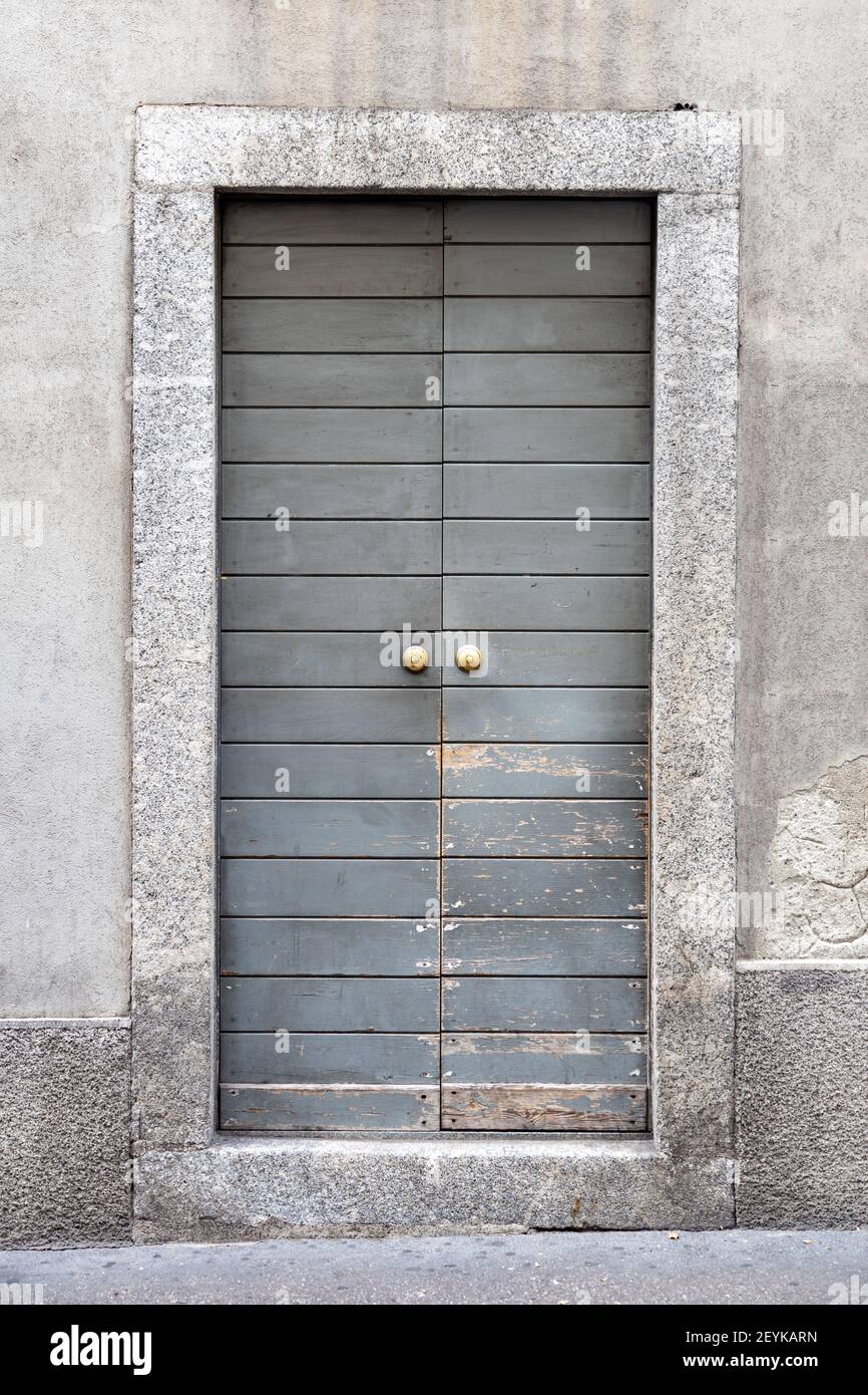 ancient grey wooden house door Como Italy Europe Stock Photo