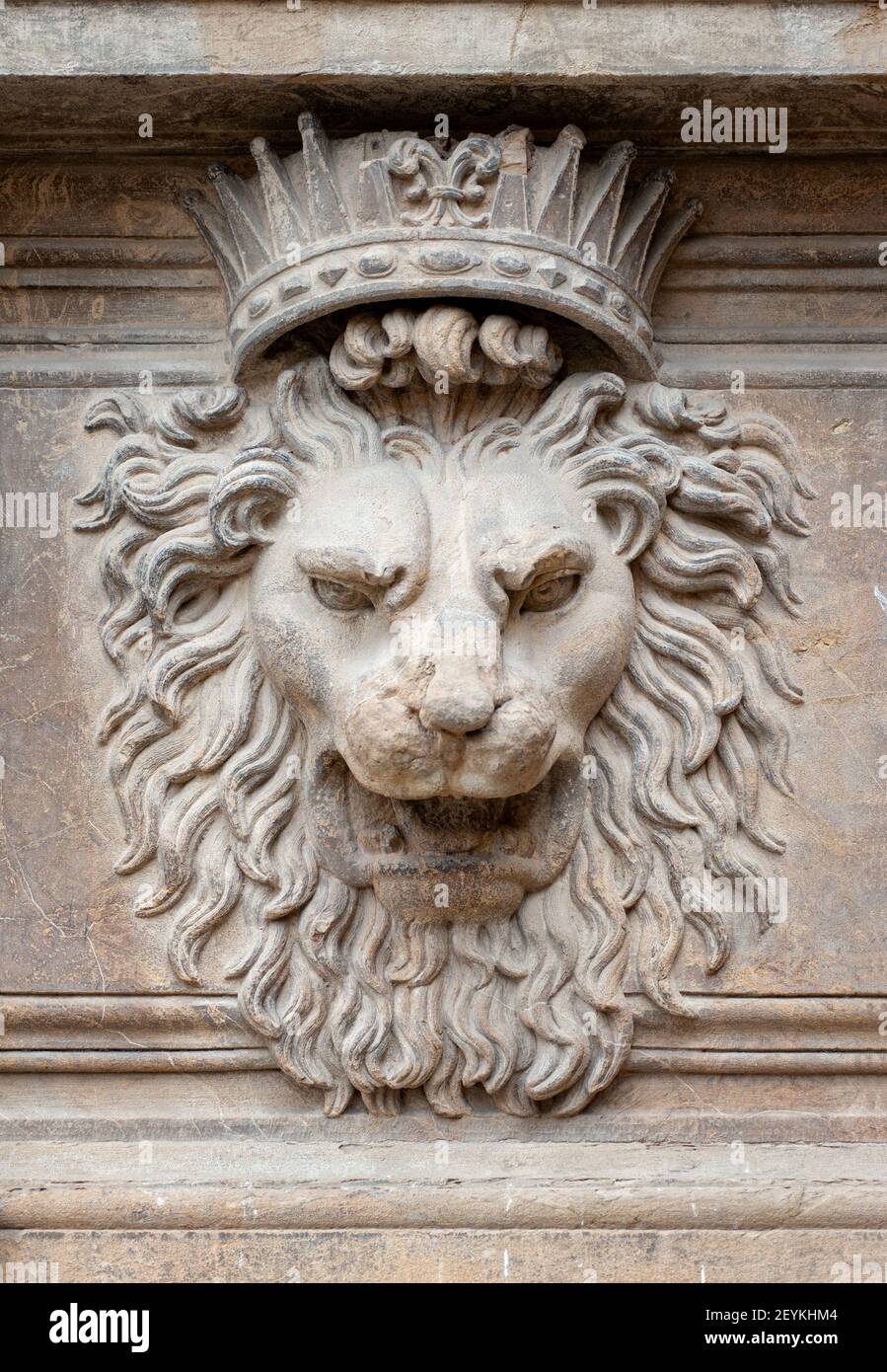 Florence, Italy - 2021, February 19: Lion's head stonework detail, on the facade of Palazzo Pitti. Stock Photo