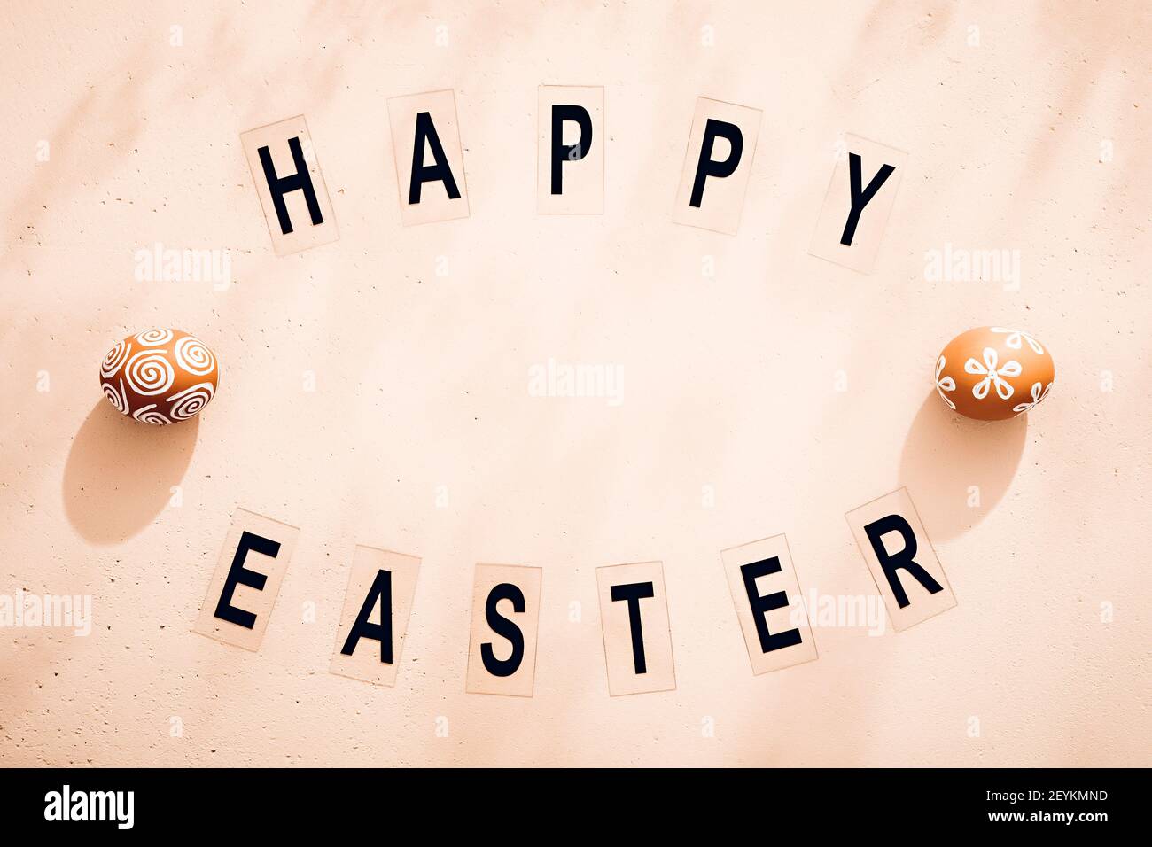 Minimalistic Easter composition. Retro style text. Top view. Flat lay Stock Photo