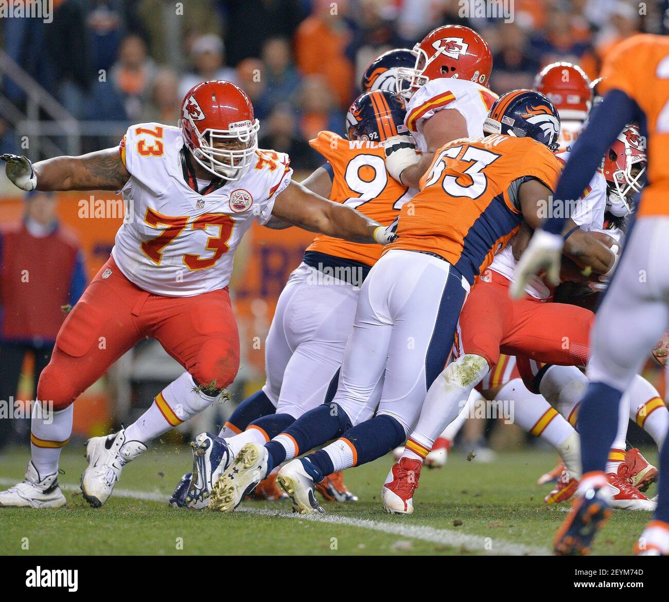 Steven Johnson (53) of the Denver Broncos stops Jamaal Charles (25) of the Kansas City Chiefs from reaching the end zone to bring up fourth down during the second quarter in Denver on Sunday, Nov. 17, 2013. (Photo by John Sleezer/Kansas City Star/MCT/Sipa USA) Stock Photo