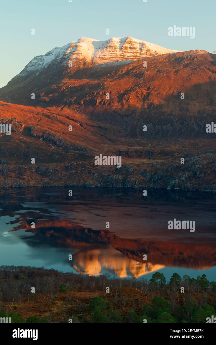 Winter sunrise on Slioch mountain, Wester Ross Stock Photo