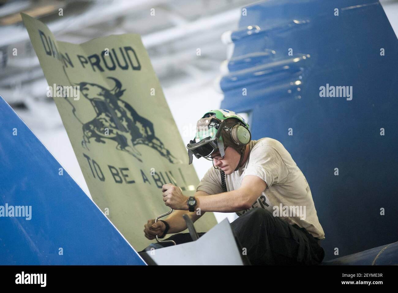 U.S. Navy Aviation Structural Mechanic 2nd Class Ben Anderson opens ...