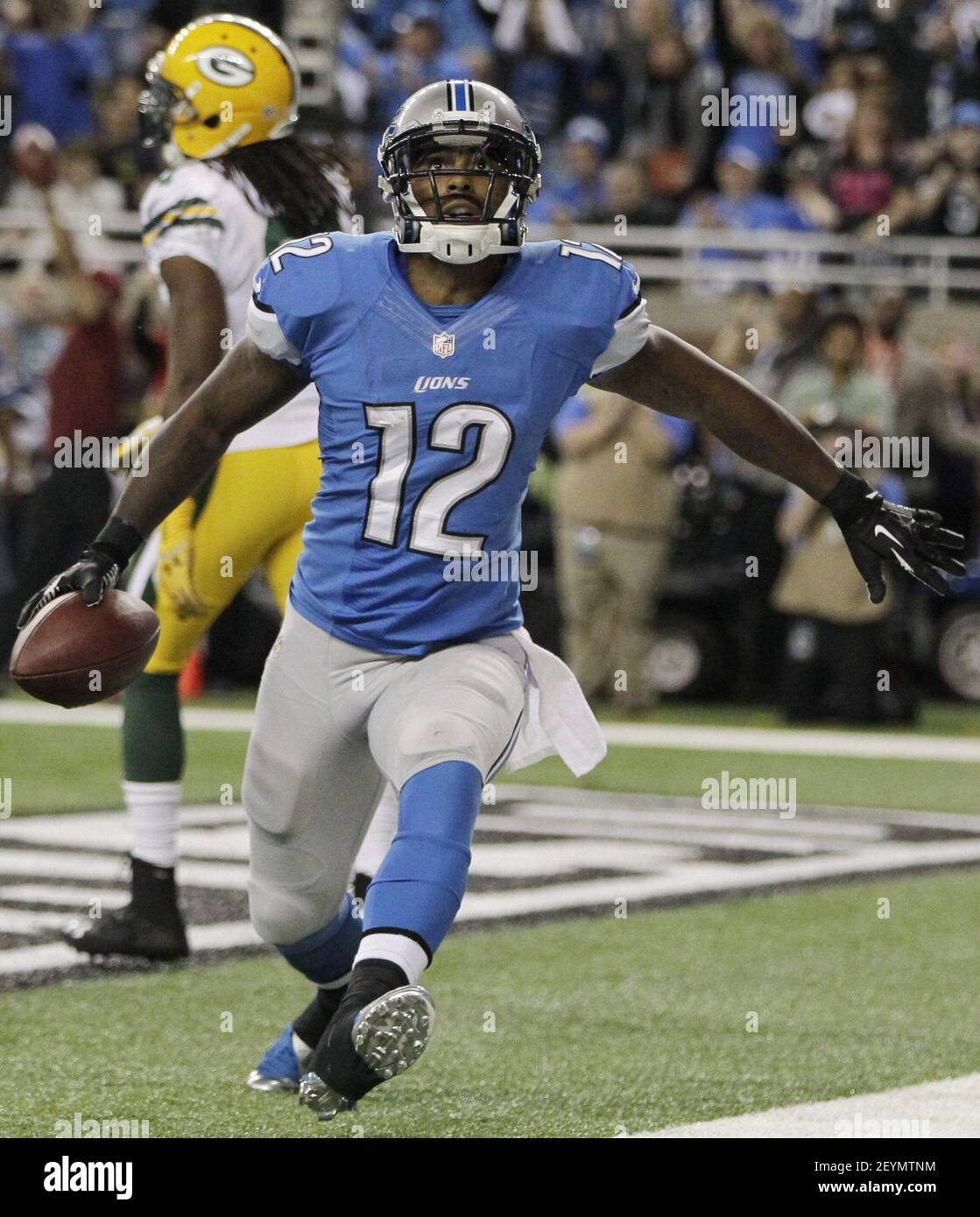 Detroit Lions wide receiver Jeremy Ross (12) celebrates his five-yard  touchdown reception during the second quarter against the Green Bay Packers  at Ford Field in Detroit on Thursday, Nov. 28, 2013. (Photo