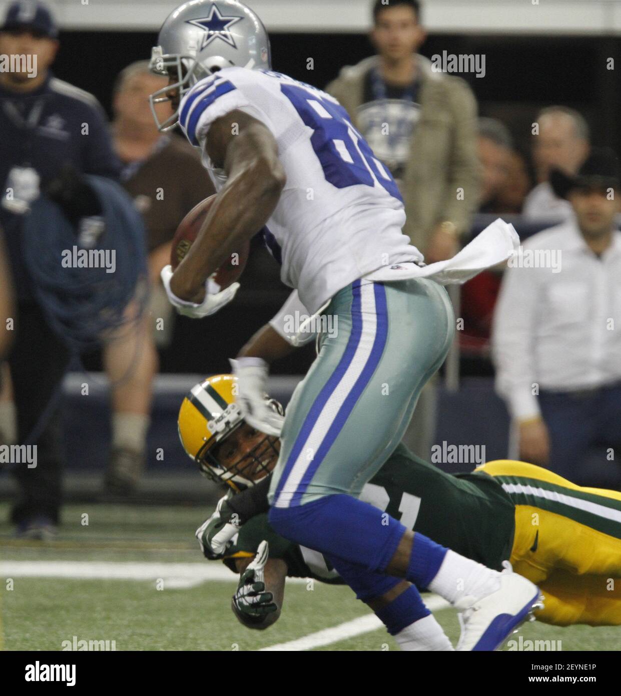 Dallas Cowboys wide receiver David Durden, top, attempts to make a catch as  cornerback Eric Scott Jr. defends during the NFL football team's training  camp Monday, July 31, 2023, in Oxnard, Calif. (