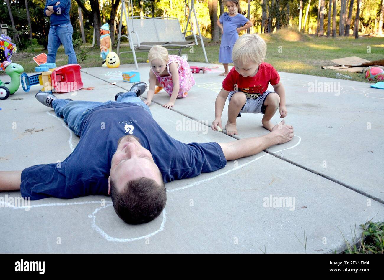 Bluffton, S.C., resident and stayathome dad Nate Ulmer, left, holds
