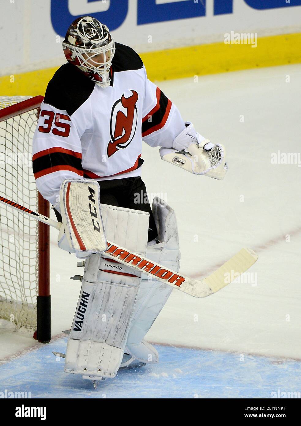 New Jersey Devils goalie Cory Schneider (35) warms up before the game  against the Washington Capitals at the Verizon Center in Washington,  Saturday, Dec. 21, 2013. Schneider is among the American players
