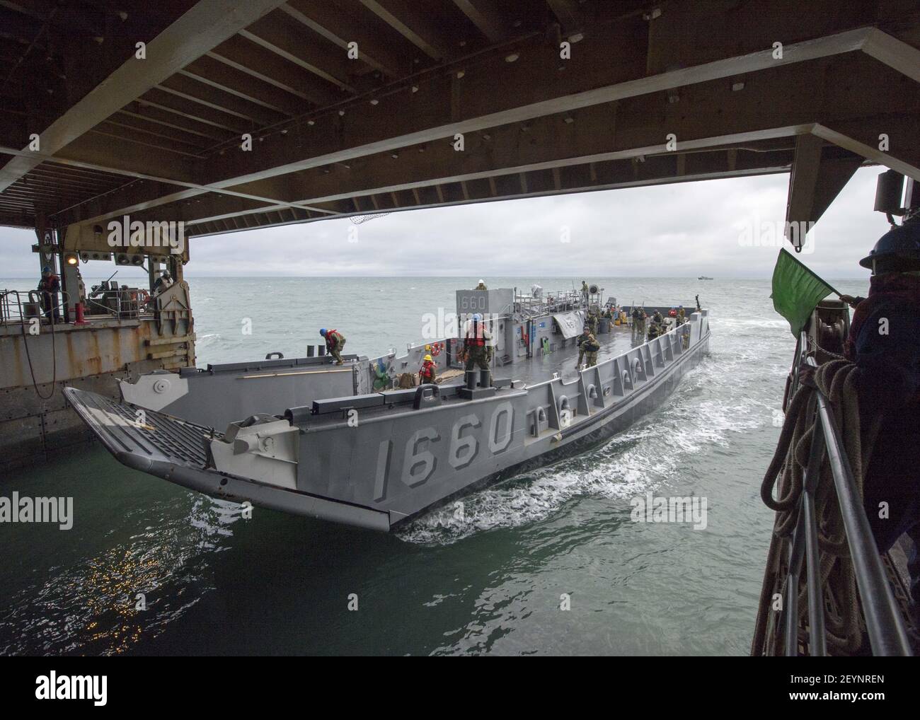 U.S. Navy Landing Craft Utility 1660 enters the well deck of the amphibious dock landing ship USS Gunston Hall (LSD 44) in the Atlantic Ocean Dec. 8, 2013. The Gunston Hall, with the embarked 22nd Marine Expeditionary Unit, was underway conducting routine qualifications. (Photo by Mass Communication Specialist Seaman Jesse A. Hyatt, U.S. Navy/DoD/Sipa USA) Stock Photo