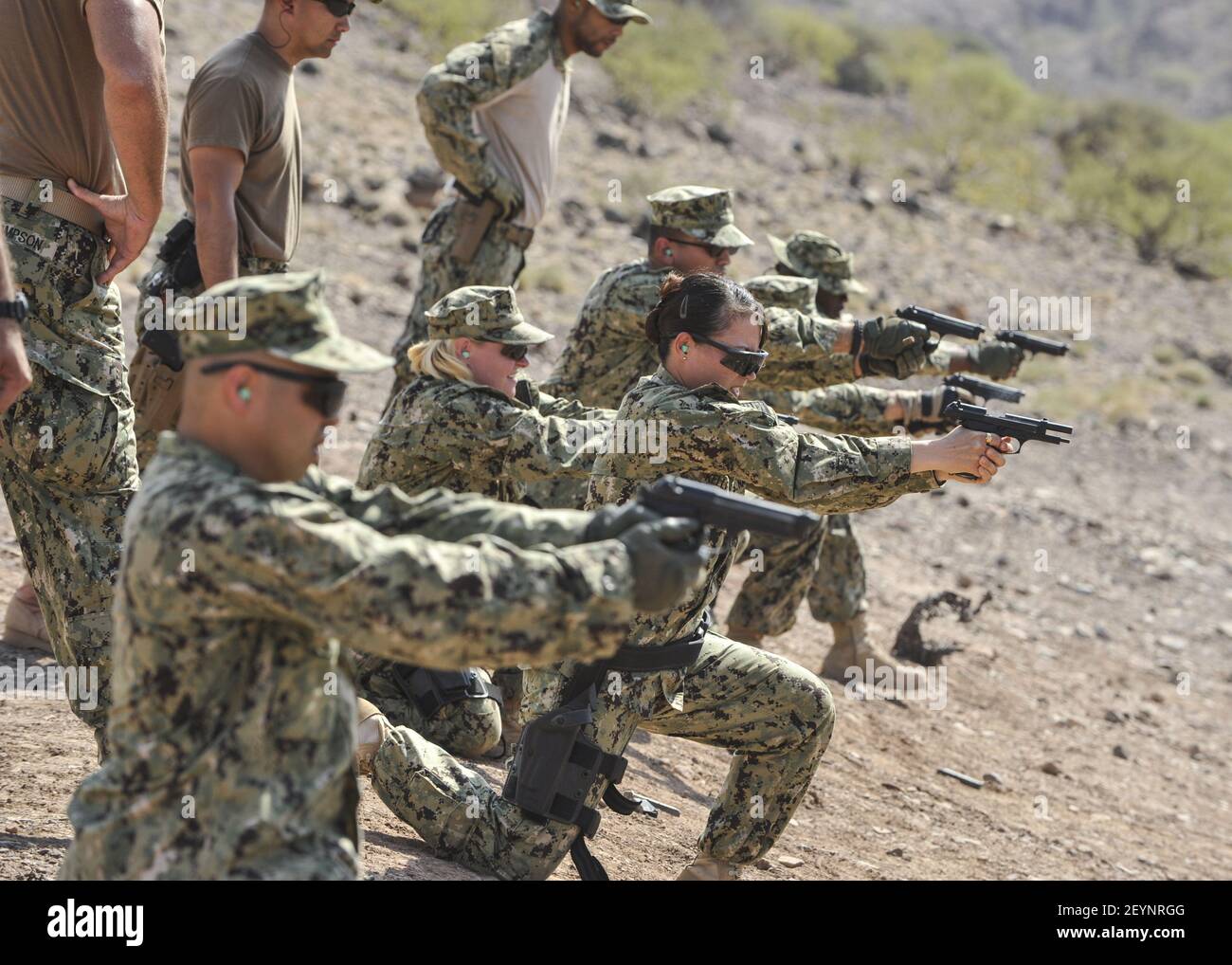 u-s-sailors-assigned-to-camp-lemonnier-fire-m9-pistols-during-weapons